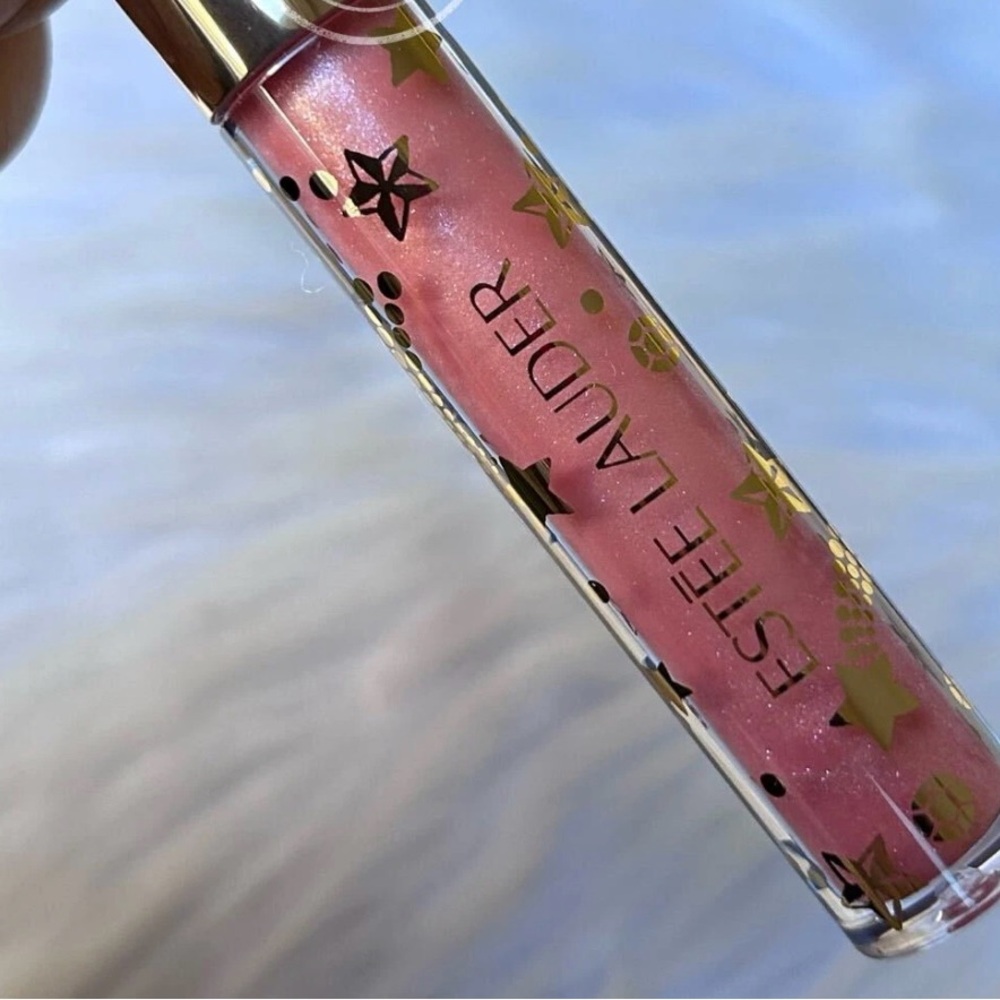 Estee Lauder Pink Shimmer Lip Gloss with Gold Star Accents